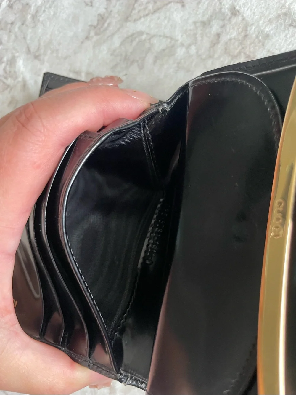Gucci Black Patent Leather Trifold Wallet with Gold Bar Detail